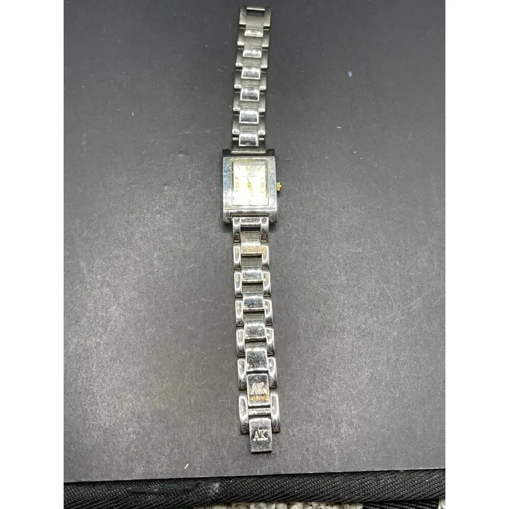 Anne Klein Women's 10/1409 Silver Dial Gold Accented Quartz Watch 21.5mm 6.5